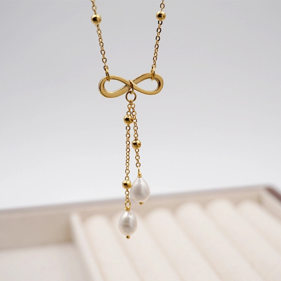 304 Stainless Steel Freshwater Pearl Gold Plated Casual Vintage Style Simple Style Infinity Bow Knot Pendant Necklace