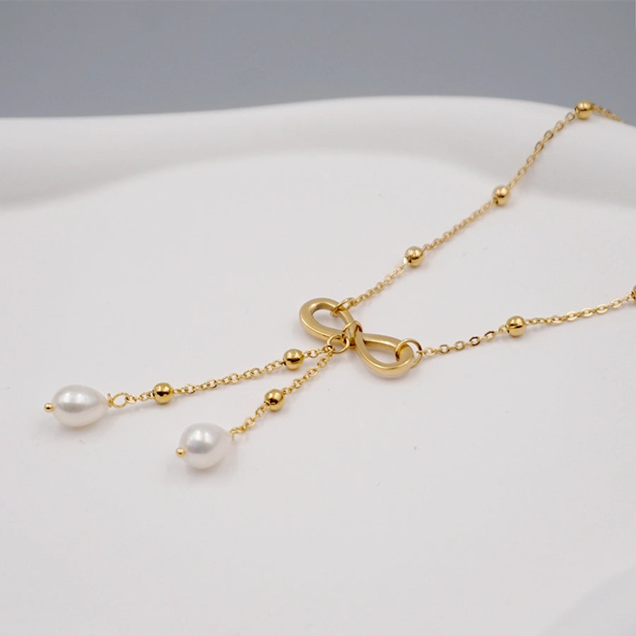 304 Stainless Steel Freshwater Pearl Gold Plated Casual Vintage Style Simple Style Infinity Bow Knot Pendant Necklace