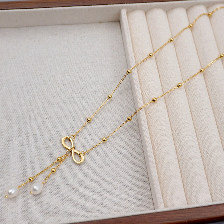 304 Stainless Steel Freshwater Pearl Gold Plated Casual Vintage Style Simple Style Infinity Bow Knot Pendant Necklace