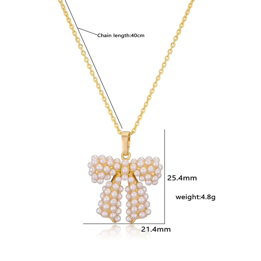Copper Casual Elegant Simple Style Inlay Bow Knot Artificial Pearls Zircon Pendant Necklace