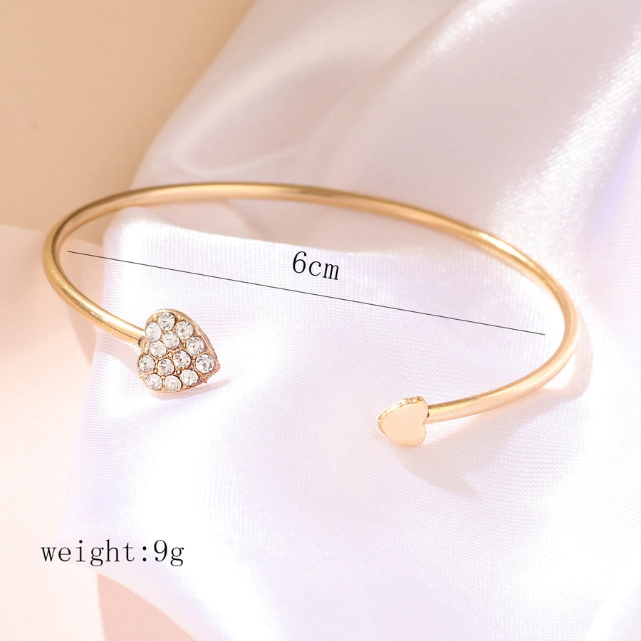 elegant heart shape twist alloy plating inlay rhinestones rose gold plated women's cuff bracelets